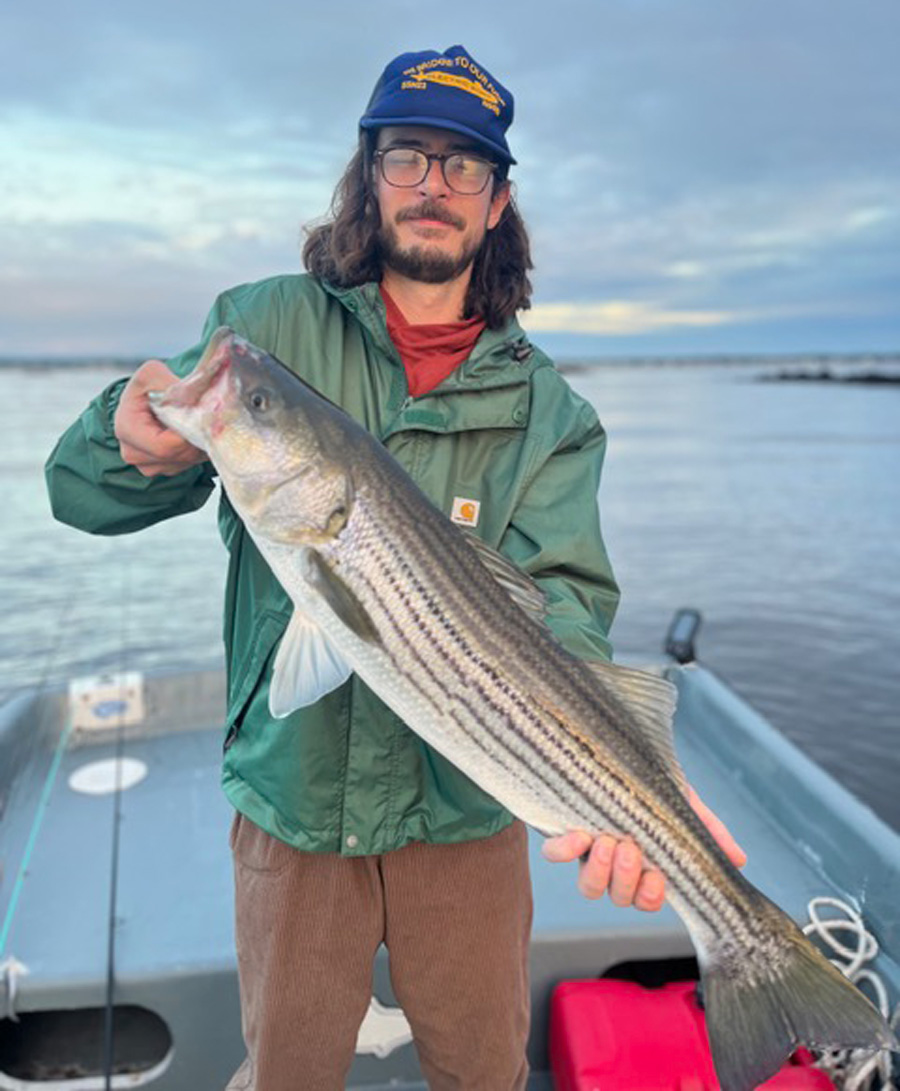 Josh with striped bass