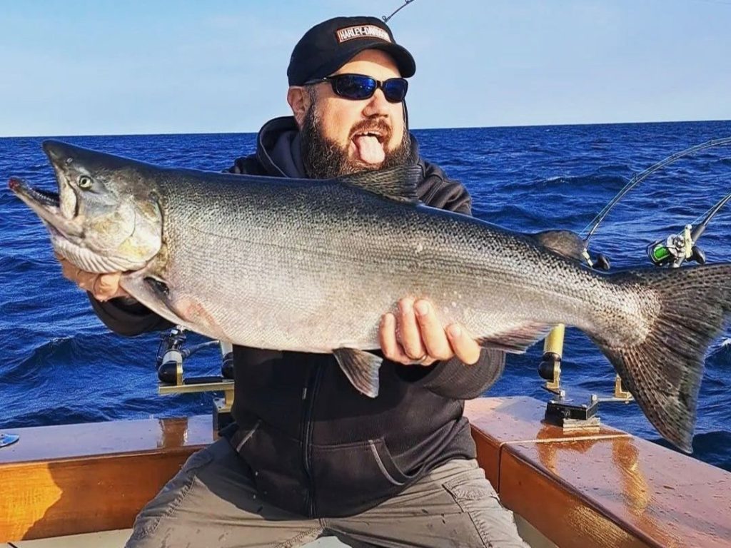 Lee L, of Peekskill NY, shows off a big king