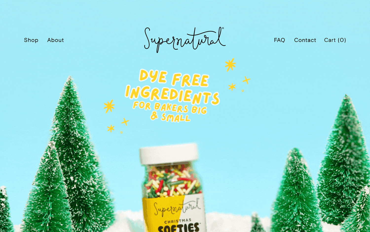 Supernatural Kitchen website showcasing parallax scrolling with festive trees and vibrant product visuals